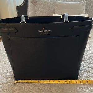 Black leather Kate Spade tote,laptop zip divider.2 outside pockets.Used 1 week.